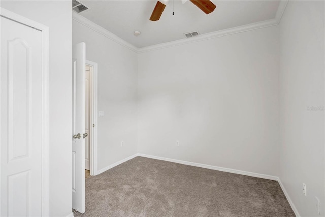 7762 Newlan Dr, Orlando, FL 32818 - spare room featuring crown molding, a ceiling fan, visible vents, carpet flooring, and baseboards