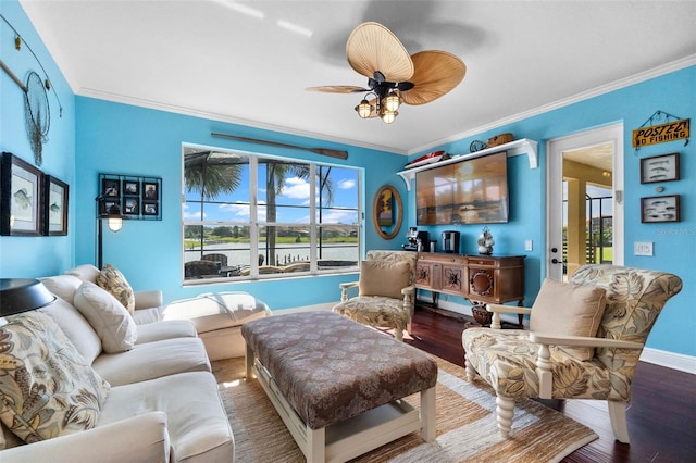 3583 Valleyview Dr, Kissimmee, FL 34746 - living room with ornamental molding, a ceiling fan, wood finished floors, and baseboards