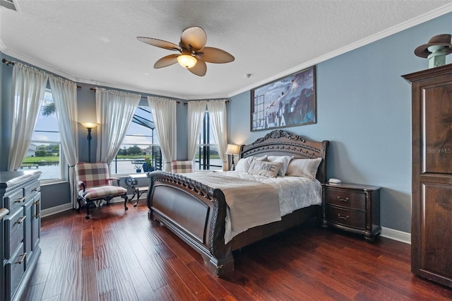 3583 Valleyview Dr, Kissimmee, FL 34746 - bedroom featuring crown molding, ceiling fan, baseboards, a textured ceiling, and dark wood-type flooring