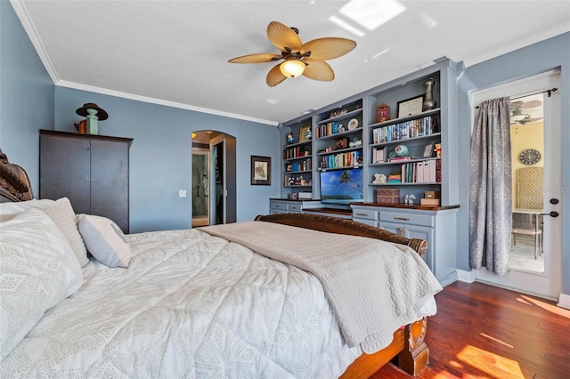 3583 Valleyview Dr, Kissimmee, FL 34746 - bedroom featuring dark wood finished floors, arched walkways, ceiling fan, and crown molding