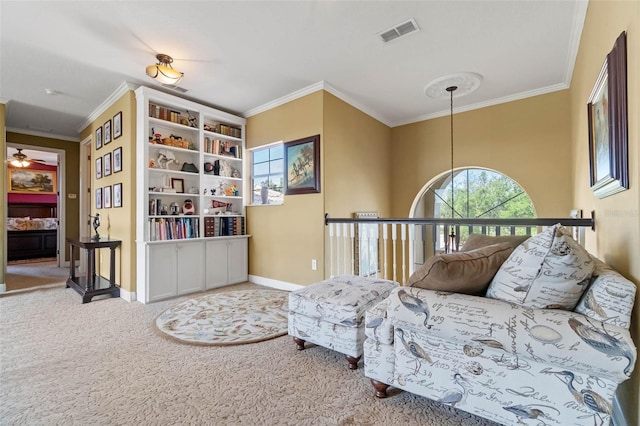 3583 Valleyview Dr, Kissimmee, FL 34746 - living area featuring visible vents, ornamental molding, and carpet floors