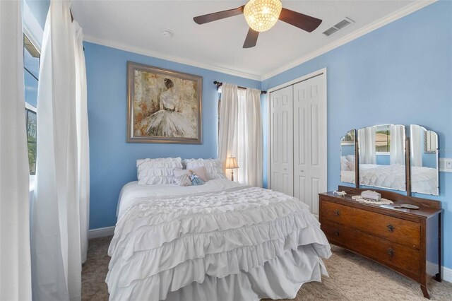 3583 Valleyview Dr, Kissimmee, FL 34746 - bedroom with carpet flooring, a closet, visible vents, and ornamental molding