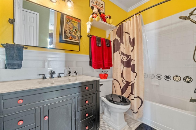 3583 Valleyview Dr, Kissimmee, FL 34746 - full bathroom with crown molding, a wainscoted wall, shower / bath combo with shower curtain, toilet, and vanity