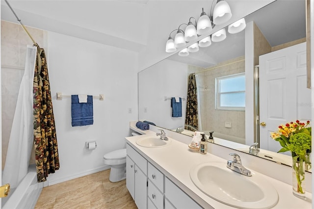 9301 Echo Run, Orlando, FL 32817 - full bath featuring toilet, shower / bathtub combination with curtain, double vanity, and baseboards