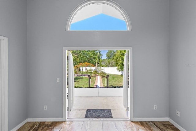 9301 Echo Run, Orlando, FL 32817 - entryway with plenty of natural light, a high ceiling, and baseboards