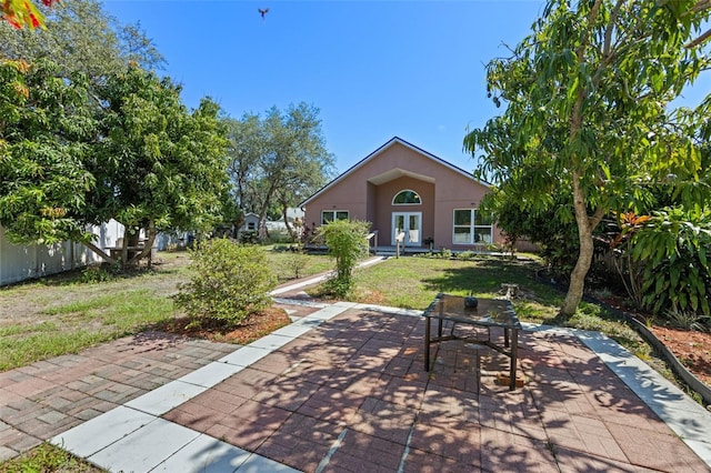 9301 Echo Run, Orlando, FL 32817 - view of patio / terrace featuring french doors