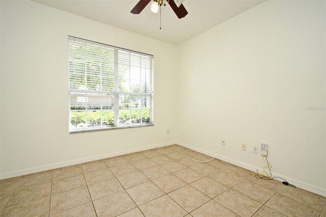 4626 Redmond Pl, Sanford, FL 32771 - empty room featuring light tile patterned floors, ceiling fan, and baseboards