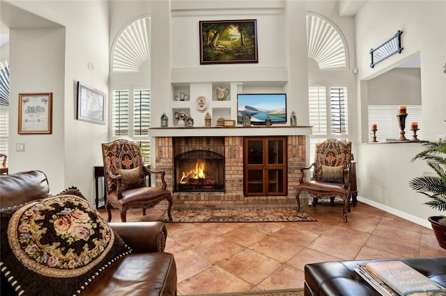 738 Powderhorn Cir, Lake Mary, FL 32746 - living area with a wealth of natural light, a towering ceiling, and a fireplace