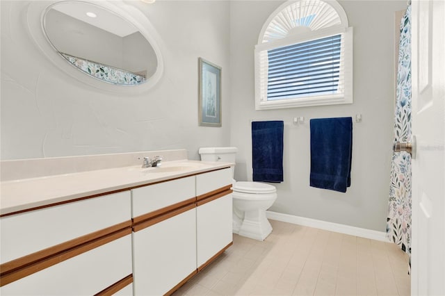 738 Powderhorn Cir, Lake Mary, FL 32746 - full bath featuring baseboards, curtained shower, toilet, vanity, and tile patterned flooring