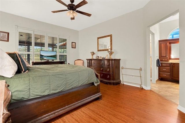 738 Powderhorn Cir, Lake Mary, FL 32746 - bedroom featuring multiple windows, light wood-type flooring, baseboards, and a ceiling fan