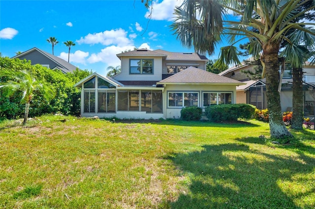 738 Powderhorn Cir, Lake Mary, FL 32746 - back of property featuring a yard, a sunroom, and roof with shingles