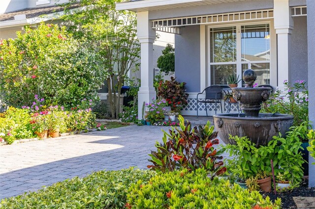 7837 Bostonian Dr, Winter Garden, FL 34787 - view of patio / terrace with covered porch