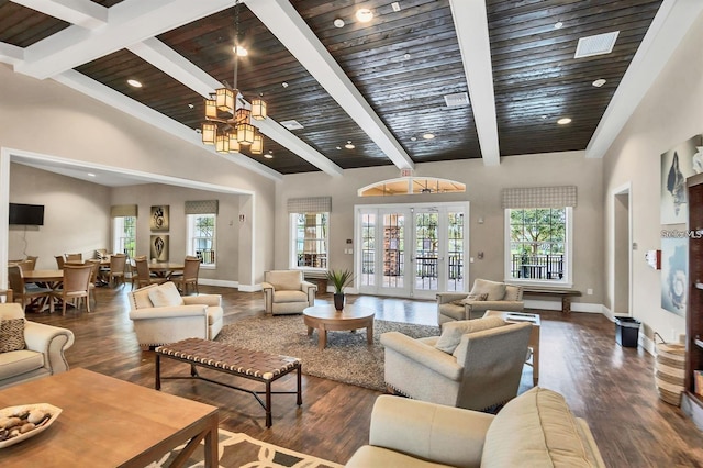 7837 Bostonian Dr, Winter Garden, FL 34787 - living area with baseboards, wood ceiling, wood finished floors, and beam ceiling