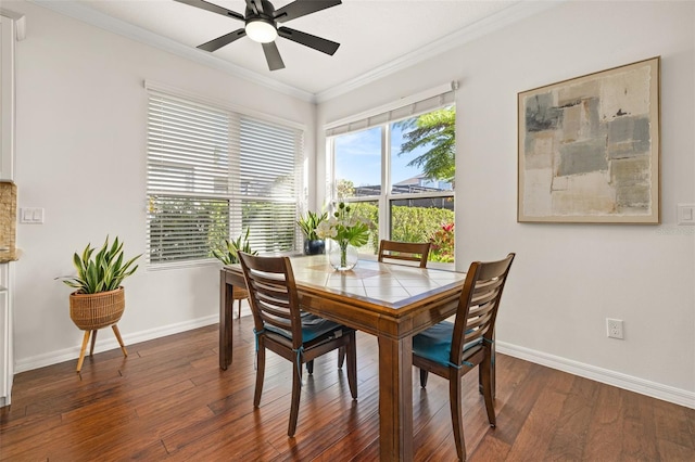 7837 Bostonian Dr, Winter Garden, FL 34787 - dining space featuring baseboards, ornamental molding, a ceiling fan, and wood finished floors