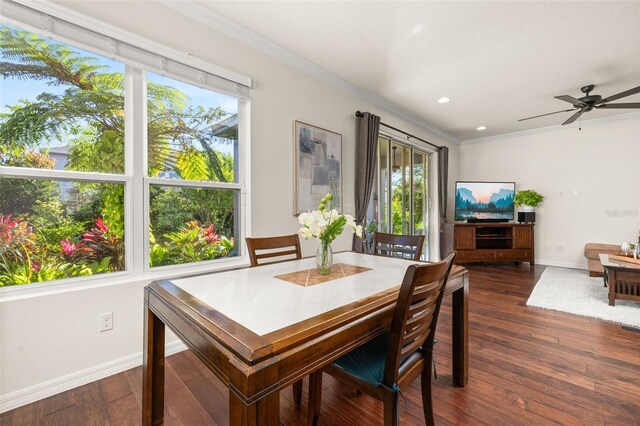 7837 Bostonian Dr, Winter Garden, FL 34787 - dining space featuring baseboards, recessed lighting, crown molding, and dark wood-style floors