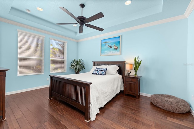 7837 Bostonian Dr, Winter Garden, FL 34787 - bedroom with baseboards, dark wood-type flooring, and a tray ceiling