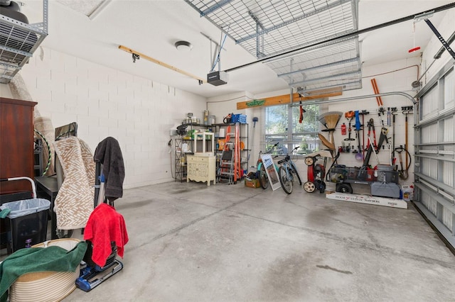 7837 Bostonian Dr, Winter Garden, FL 34787 - garage with concrete block wall and a garage door opener