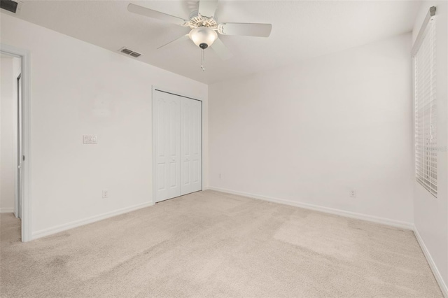 7837 Bostonian Dr, Winter Garden, FL 34787 - unfurnished bedroom with light colored carpet and visible vents