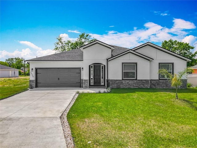 ranch-style house with a front yard, an attached garage, stone siding, stucco siding, and driveway