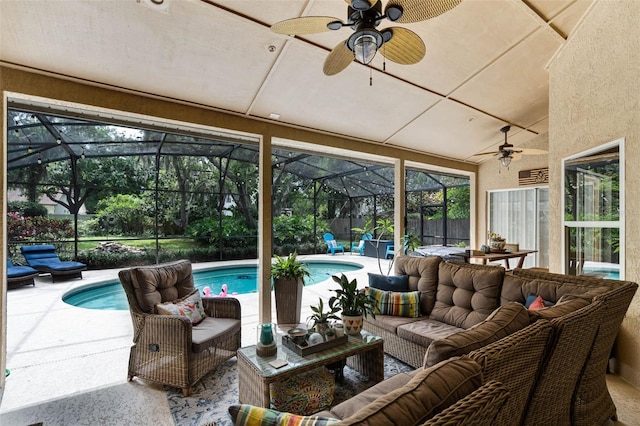 sunroom with an outdoor living space, a swimming pool, and ceiling fan