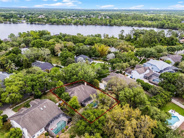 bird's eye view featuring a water view and a residential view
