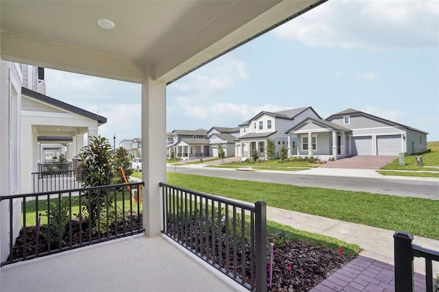 16484 Silver Brook Way, Winter Garden, FL 34787 - view of patio with a residential view and a porch