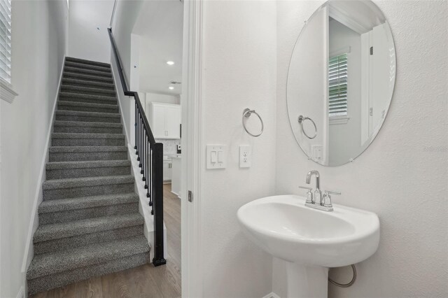 16484 Silver Brook Way, Winter Garden, FL 34787 - bathroom with wood finished floors and a sink