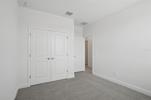 16484 Silver Brook Way, Winter Garden, FL 34787 - unfurnished bedroom featuring carpet floors, baseboards, and a closet