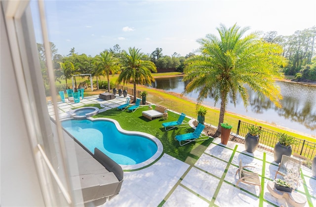 6550 Cartmel Ln, Windermere, FL 34786 - view of pool with a pool with connected hot tub, fence, a water view, and a patio