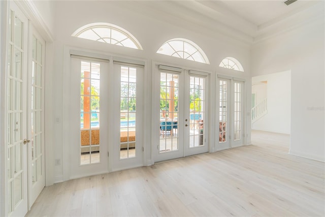 6550 Cartmel Ln, Windermere, FL 34786 - doorway with french doors, plenty of natural light, and wood finished floors