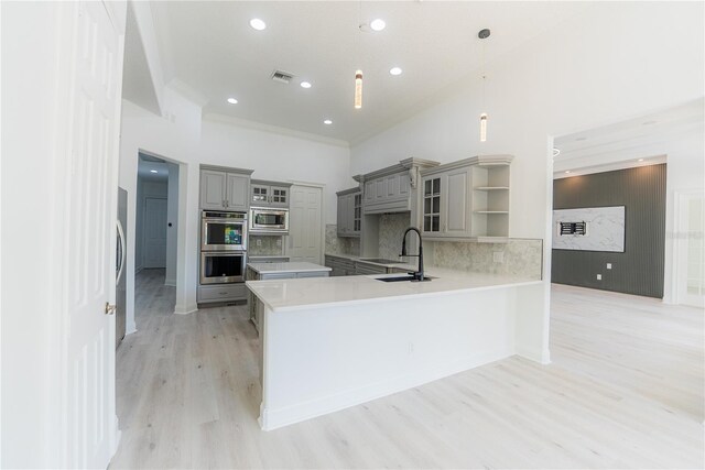 6550 Cartmel Ln, Windermere, FL 34786 - kitchen featuring visible vents, a sink, open shelves, appliances with stainless steel finishes, and gray cabinets