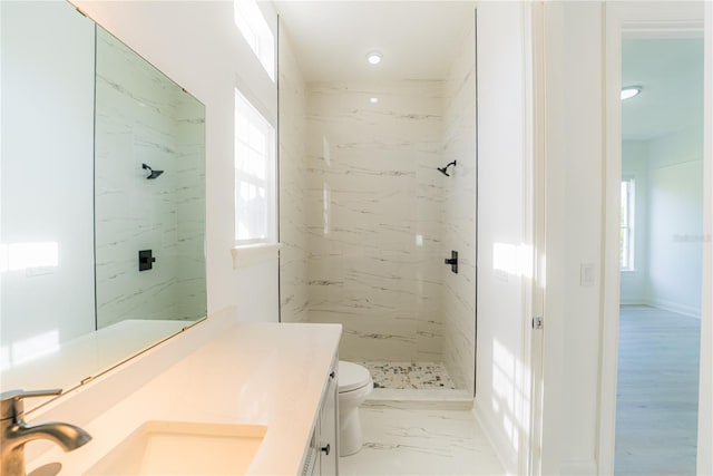 6550 Cartmel Ln, Windermere, FL 34786 - bathroom featuring toilet, marble finish floor, vanity, recessed lighting, and a shower stall