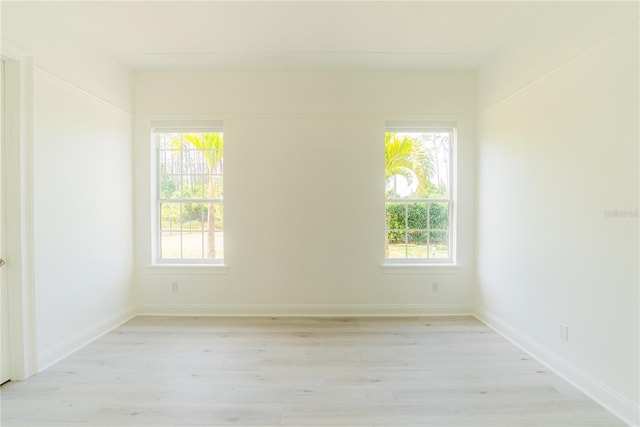 6550 Cartmel Ln, Windermere, FL 34786 - spare room with baseboards and light wood-type flooring