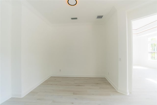 6550 Cartmel Ln, Windermere, FL 34786 - empty room featuring baseboards, ornamental molding, visible vents, and light wood-type flooring