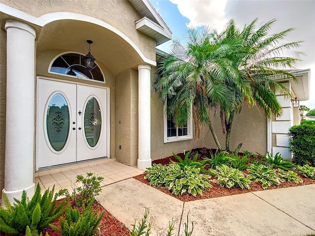 5060 NW 26th St, Ocala, FL 34482 - entrance to property with french doors and stucco siding