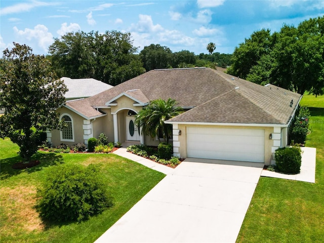 5060 NW 26th St, Ocala, FL 34482 - ranch-style home featuring stucco siding, roof with shingles, a front lawn, a garage, and concrete driveway
