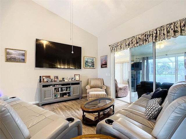 5060 NW 26th St, Ocala, FL 34482 - living area featuring light wood-style floors, baseboards, and vaulted ceiling