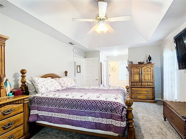 5060 NW 26th St, Ocala, FL 34482 - bedroom with carpet flooring, visible vents, a ceiling fan, and a raised ceiling