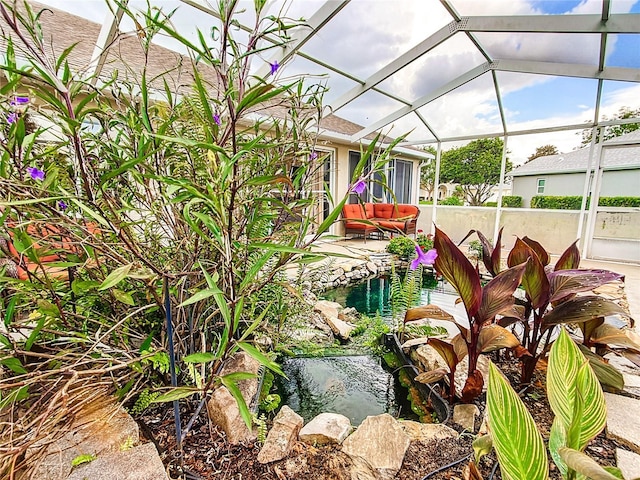 5060 NW 26th St, Ocala, FL 34482 - exterior space featuring a pool, stucco siding, and a garden pond