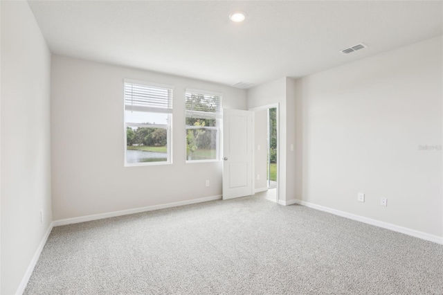 2320 E Newsome Rd, Plant City, FL 33565 - spare room with baseboards, visible vents, recessed lighting, and carpet flooring