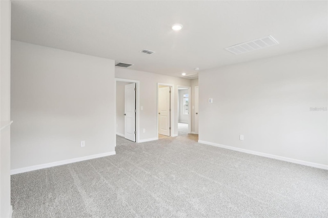 2320 E Newsome Rd, Plant City, FL 33565 - empty room featuring light carpet, baseboards, visible vents, and recessed lighting