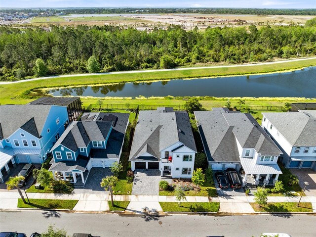 14749 Walcott Ave, Orlando, FL 32827 - drone / aerial view featuring a residential view and a water view