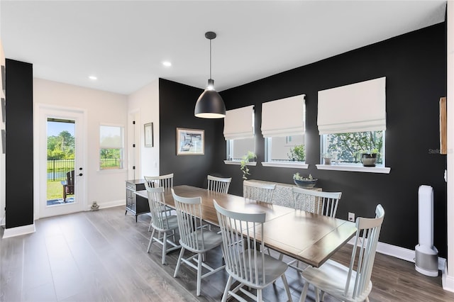 14749 Walcott Ave, Orlando, FL 32827 - dining space featuring baseboards, recessed lighting, and wood finished floors
