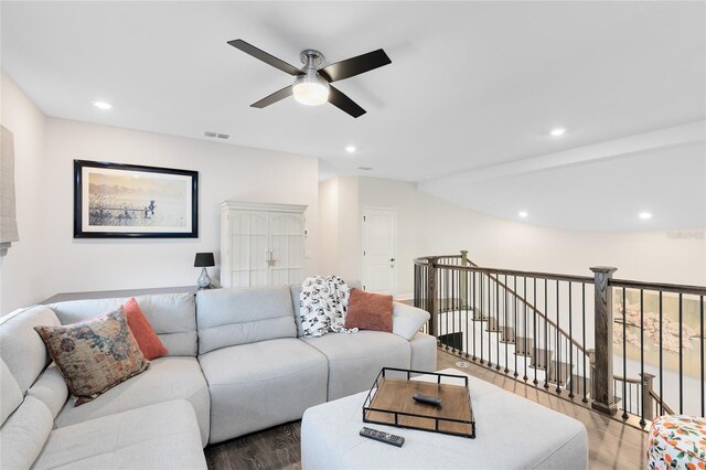 14749 Walcott Ave, Orlando, FL 32827 - living area featuring wood finished floors, ceiling fan, visible vents, and recessed lighting