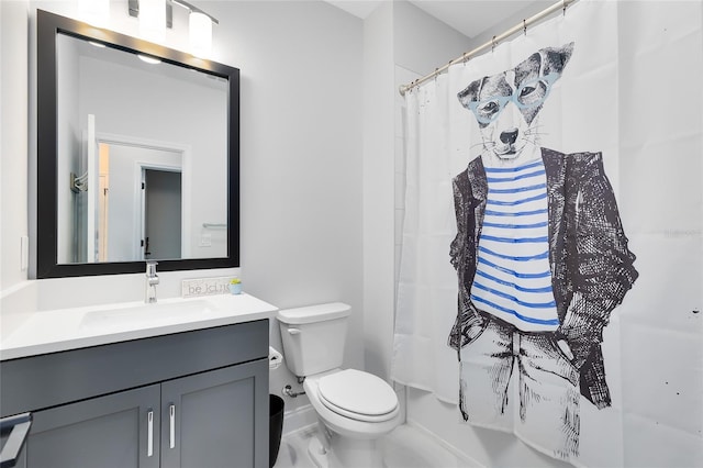 14749 Walcott Ave, Orlando, FL 32827 - full bathroom with toilet, vanity, a shower with curtain, and baseboards