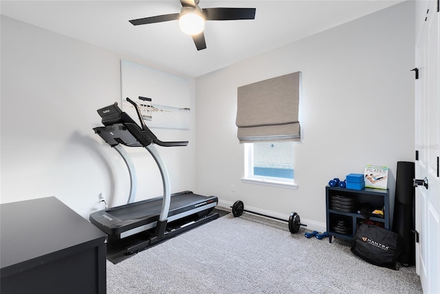 14749 Walcott Ave, Orlando, FL 32827 - exercise room featuring baseboards, a ceiling fan, and carpet