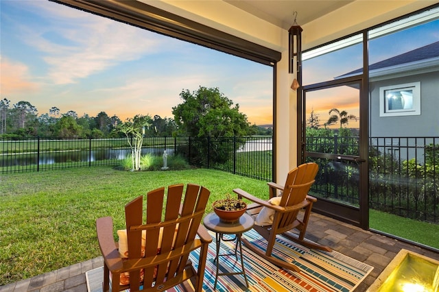 14749 Walcott Ave, Orlando, FL 32827 - sunroom with a water view and a healthy amount of sunlight
