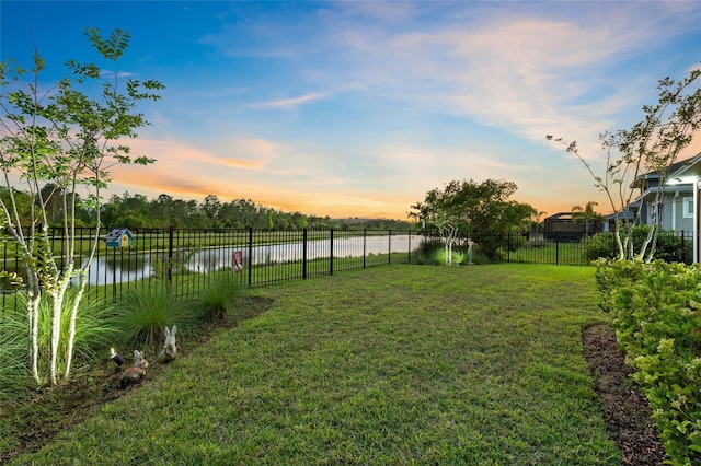14749 Walcott Ave, Orlando, FL 32827 - yard at dusk with fence and a water view