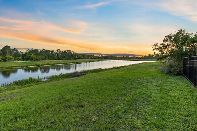 14749 Walcott Ave, Orlando, FL 32827 - property view of water with fence