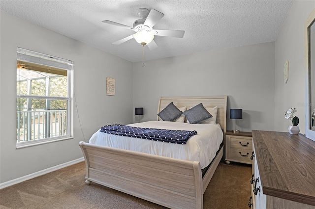 10033 Hart Branch Cir, Orlando, FL 32832 - bedroom with carpet, baseboards, a textured ceiling, and ceiling fan